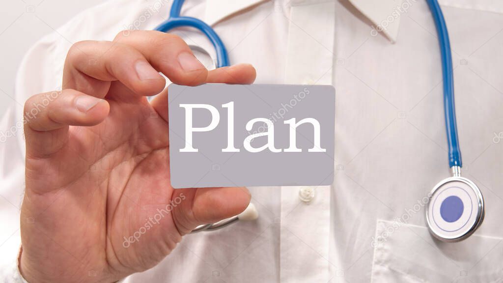 Advisor and senior reviewing Medicare plan options during an annual review.